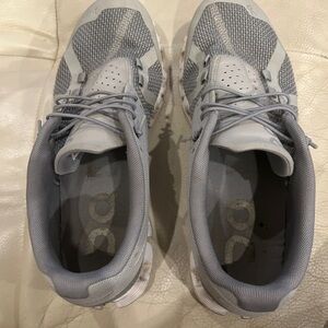On Running Gray and White Athletic Shoes